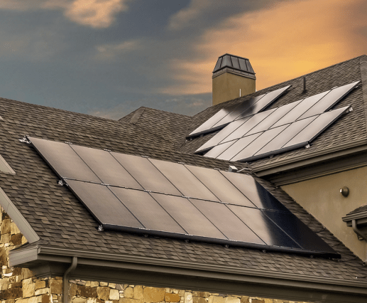 A home with Solar panels installed at Dusk