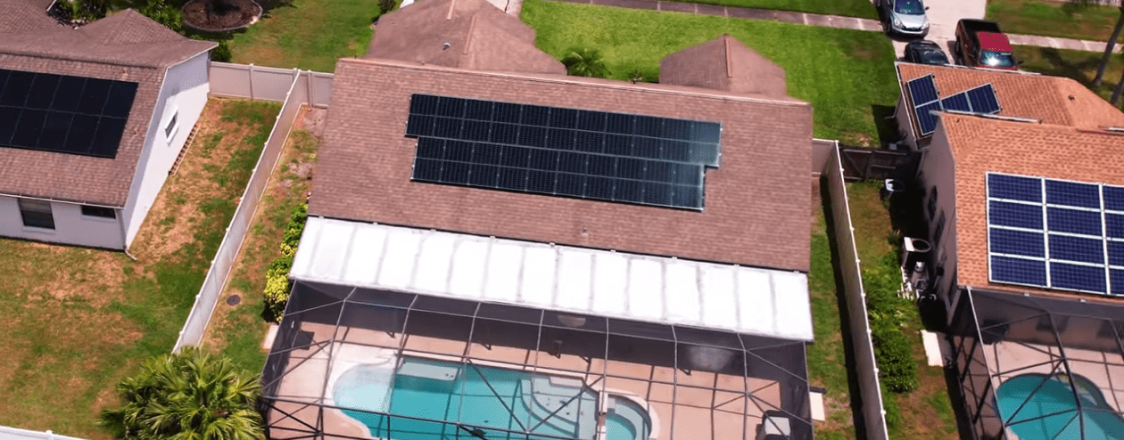 Aerial view of florida homes with rooftop solar panels